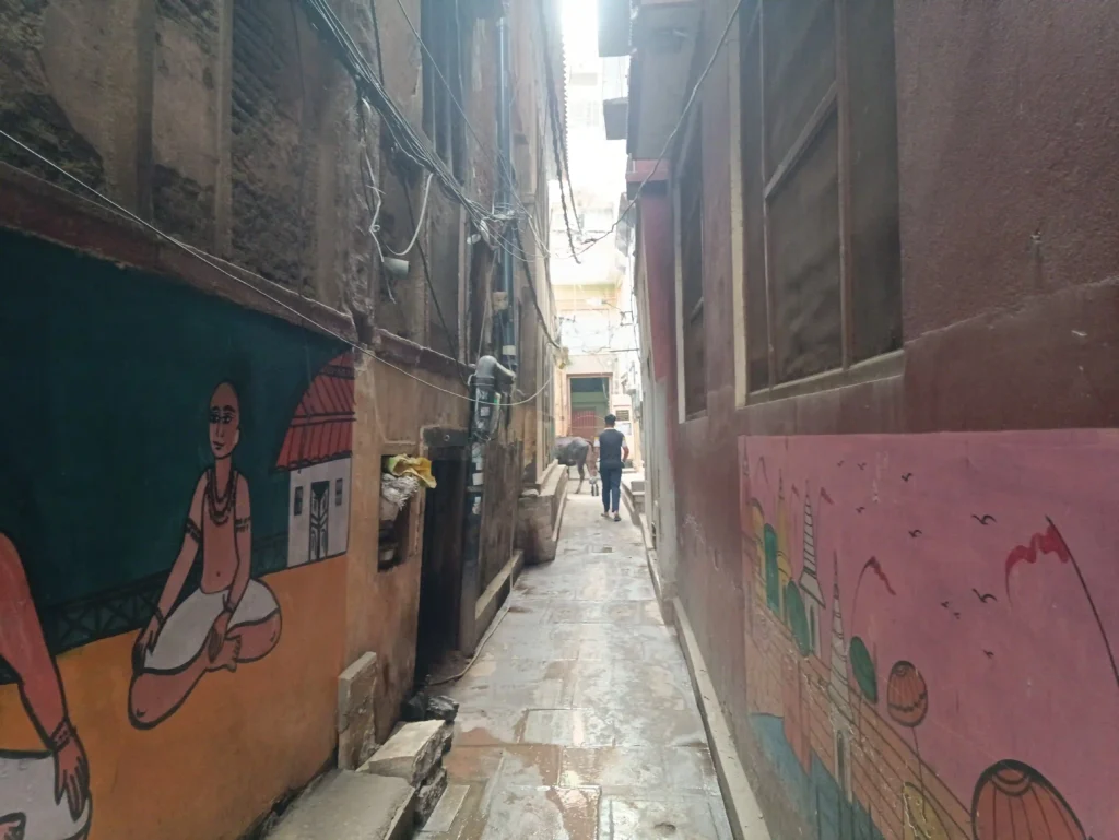 Narrow spiritual lane of Varanasi leading to the Ganges heritage way.