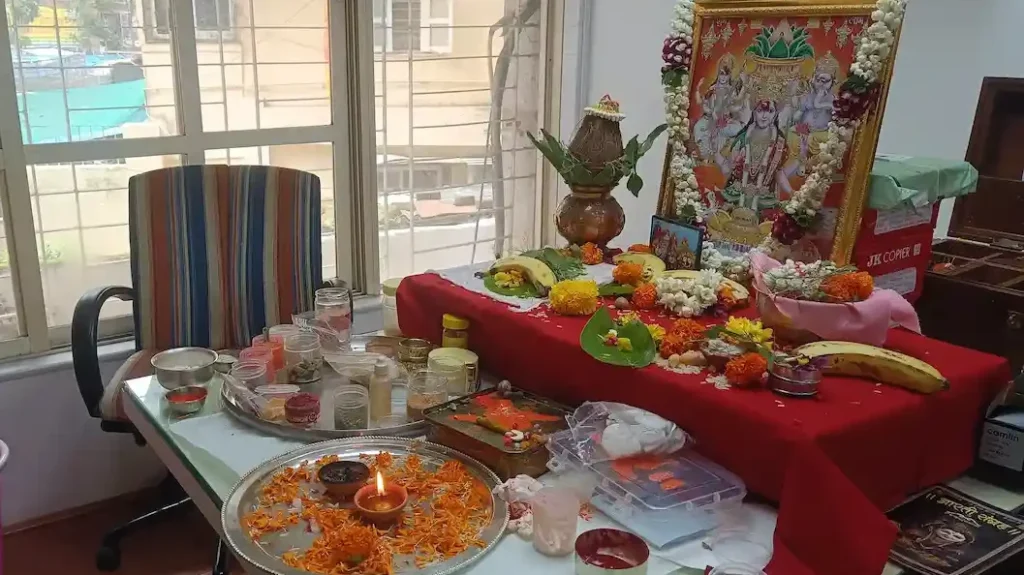 Goddess Lakshmi image and samagri setup for laxmi puja for business growth